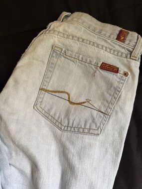 7 For All Mankind Light Blue Flare Jeans with Raw Hem